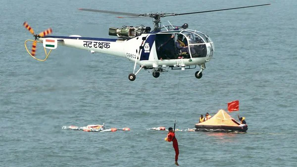 Indian Navy helicopter airlifting crew from burning Wan Hai 503 vessel