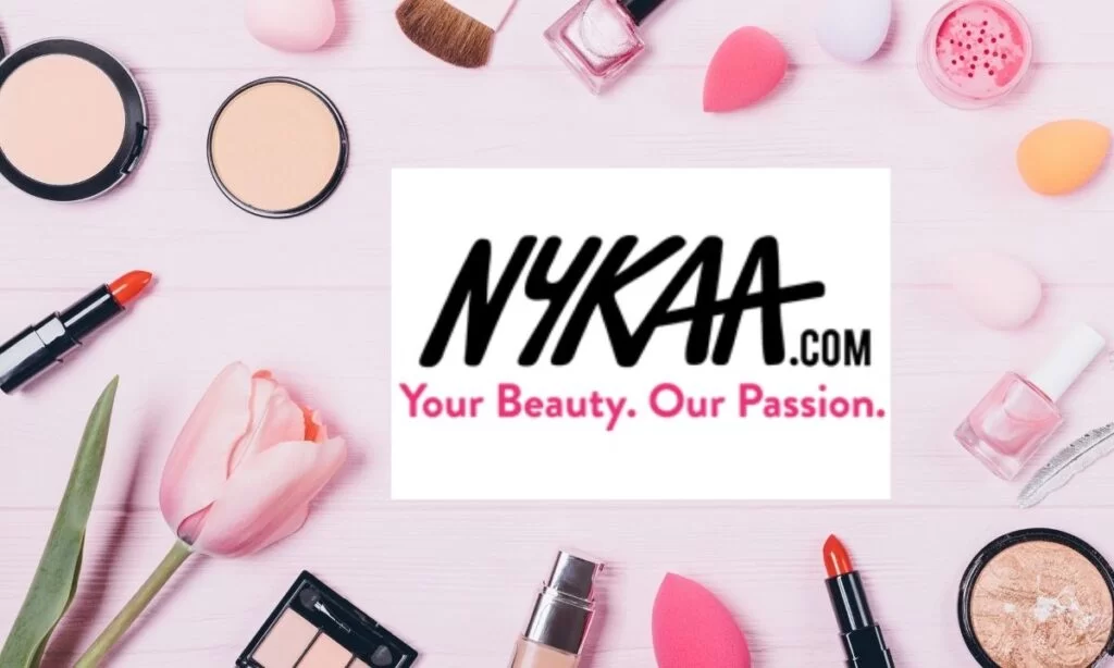 Nykaa CEO presenting growth roadmap at investor meeting.