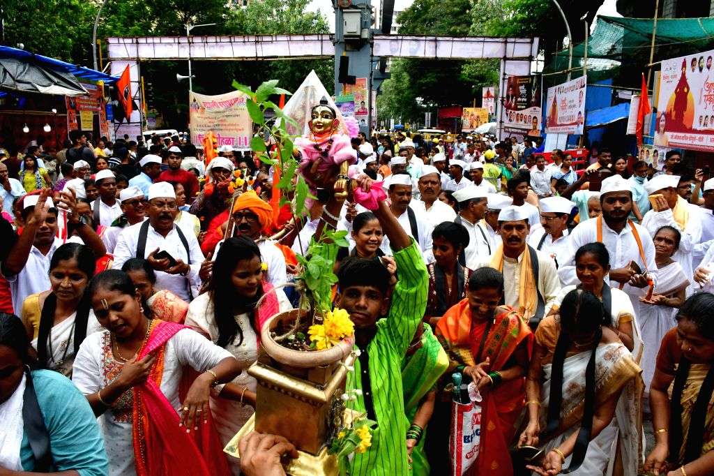 Devotees queue in Pandharpur for Vitthal darshan before Ashadhi Ekadashi.