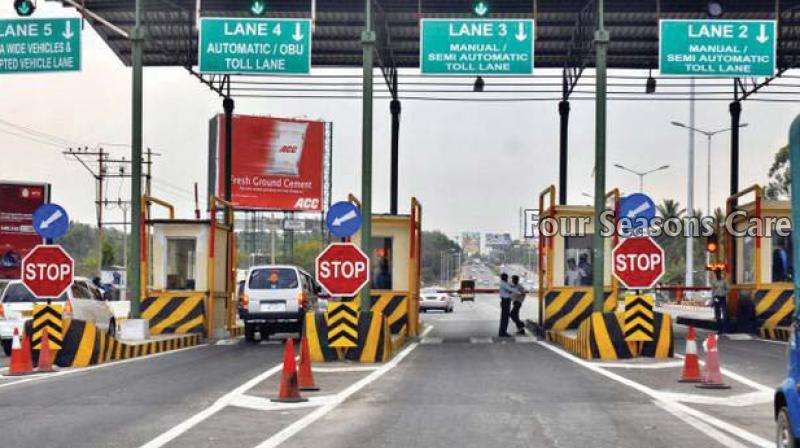 Toll booth along Madurai-Tuticorin Highway amid controversy over road maintenance.