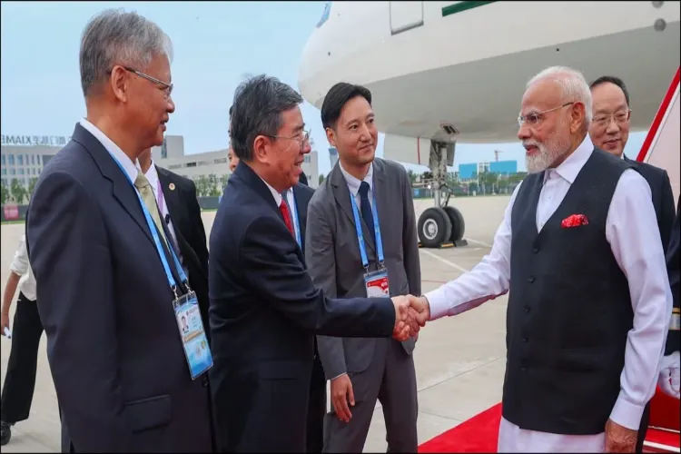 Modi arrives Tianjin SCO