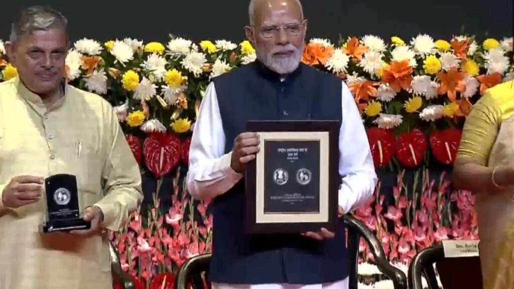 PM Modi releases commemorative coin