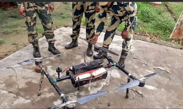 BSF soldiers inspect seized drone