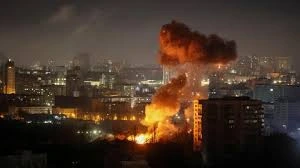 burning building after strikes