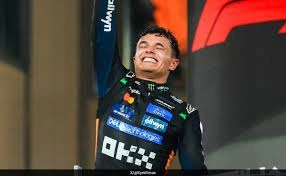 lando Norris celebrating victory, McLaren F1 car on track, podium celebration