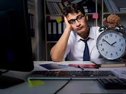 Indian worker balancing laptop and family dinner.