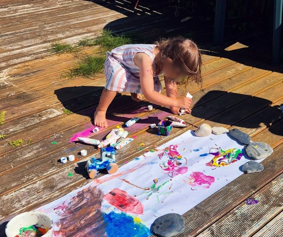 Kids enjoying 30 screen-free indoor summer crafts and games