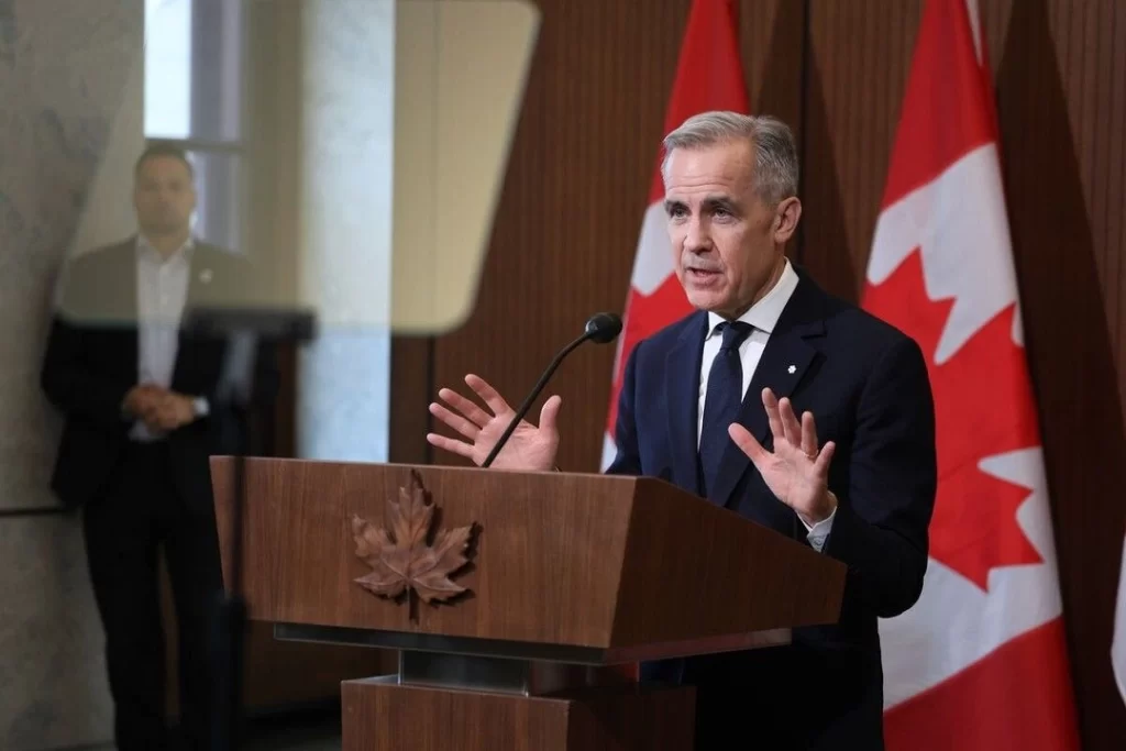 Mark Carney celebrates by-election majority win triumphantly.