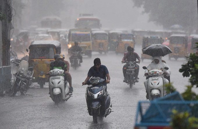Dark storm clouds over Indian city skyline